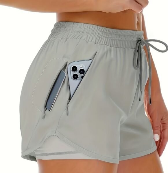 Short Fitness 2-em-1 com Bolsos Blindados – Segurança e Foco Total